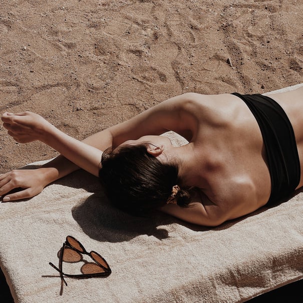 Woman Relaxing on the Beach 